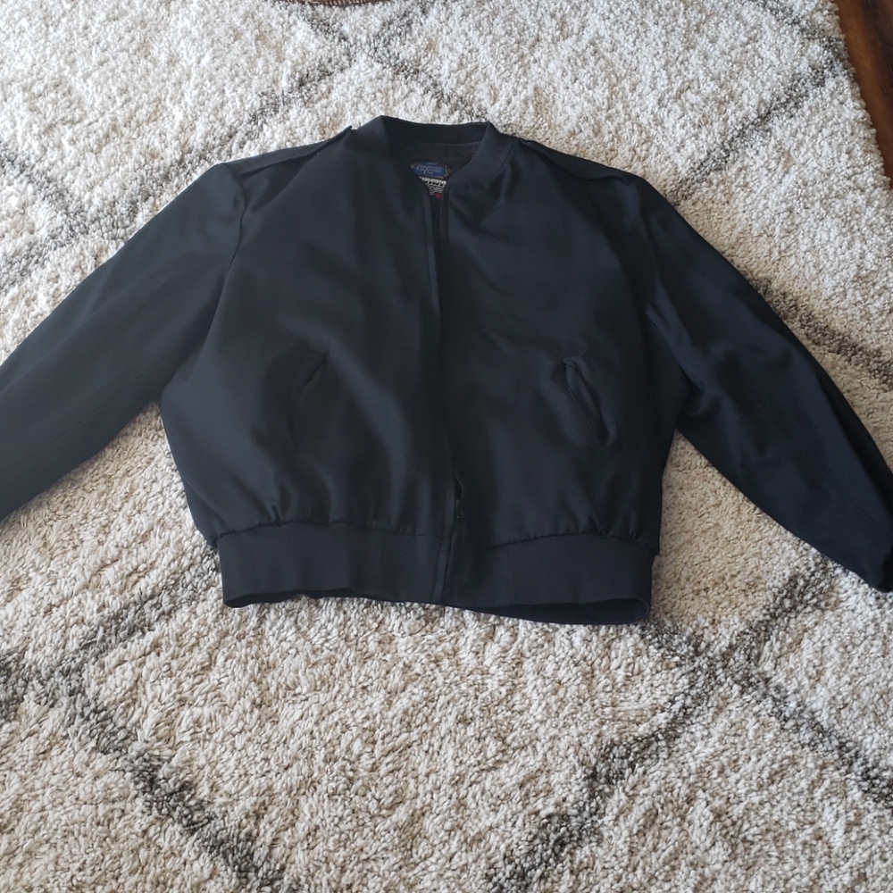 Like new jacket with removable vest liner.
